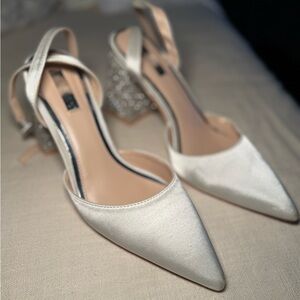 Closed toe, pointed toe rhinestone heel